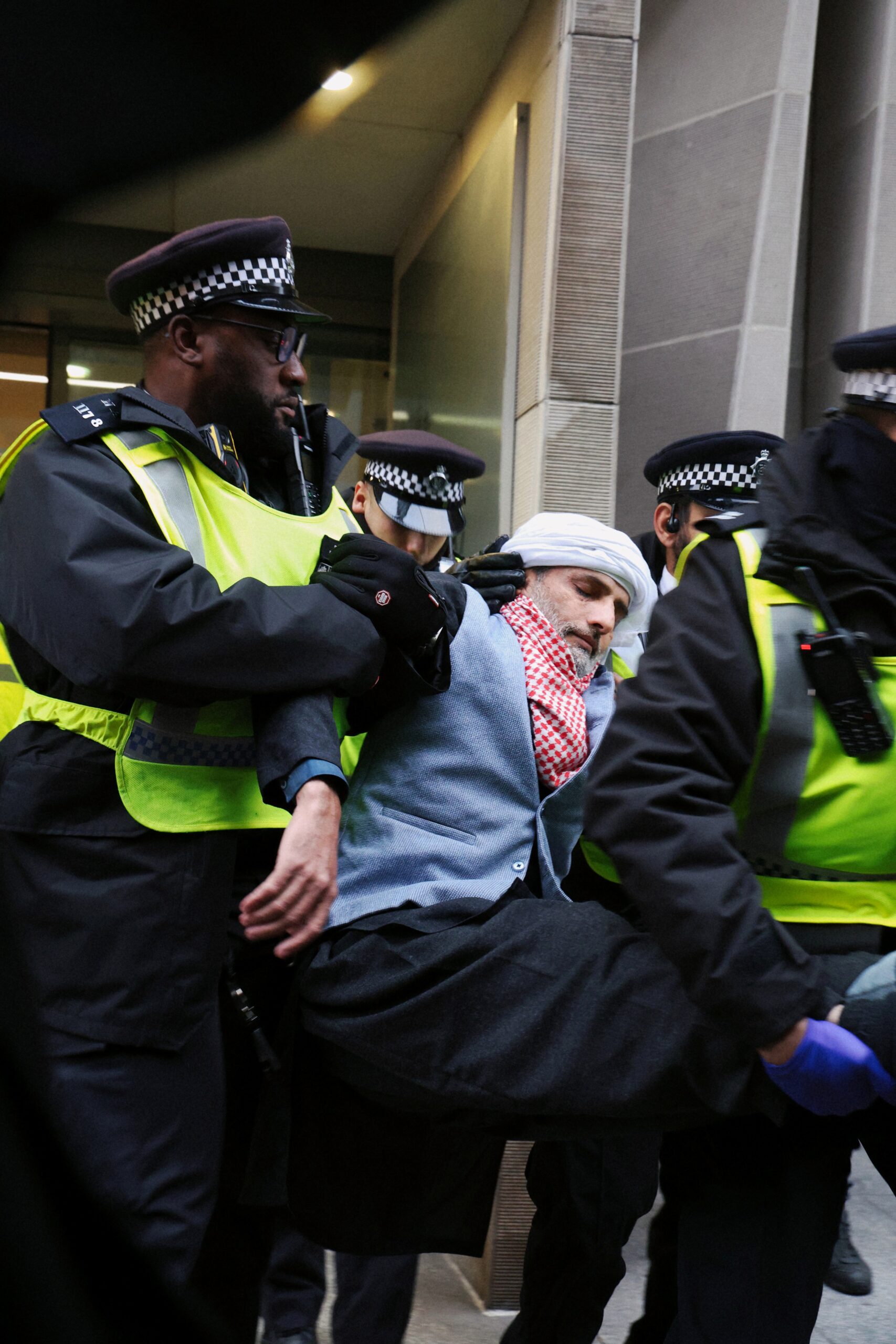 man getting arrested at Defend Our Juries protest 20 November London